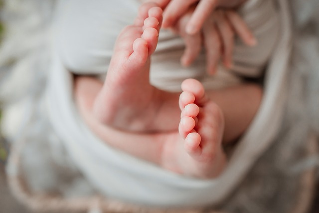 Mother's Light Baby feet