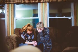 two women crying