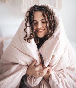 woman wrapped in blanket