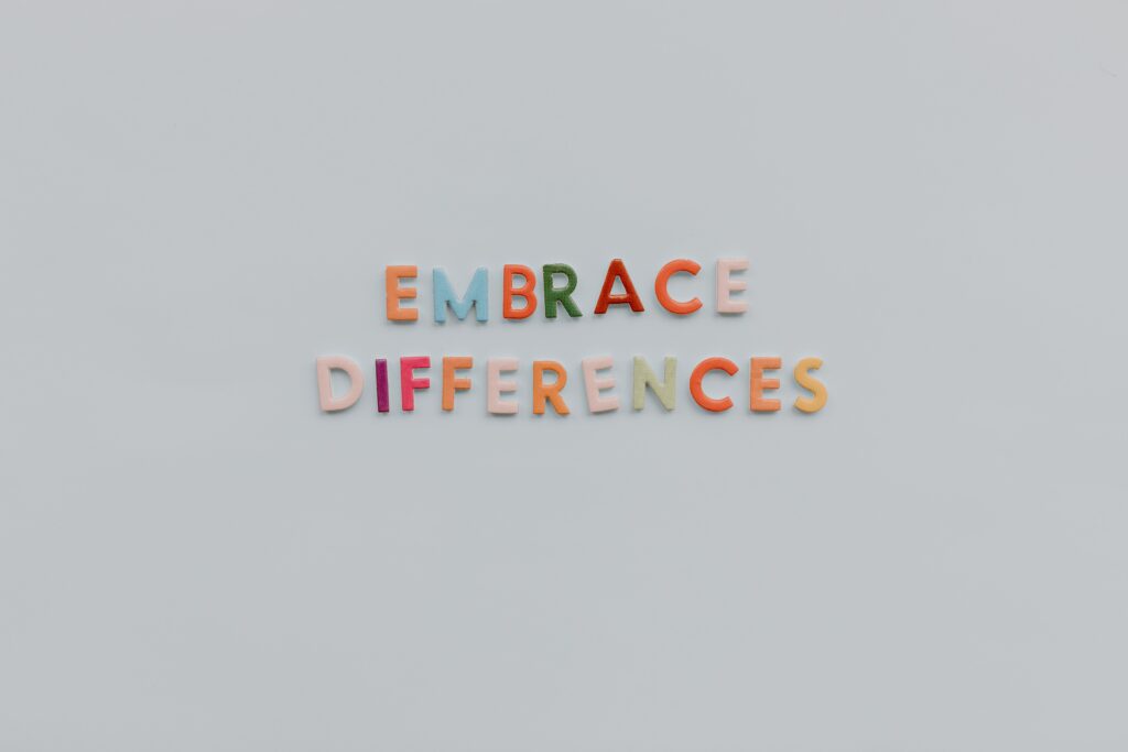 Colorful letters spelling out "embrace differences"